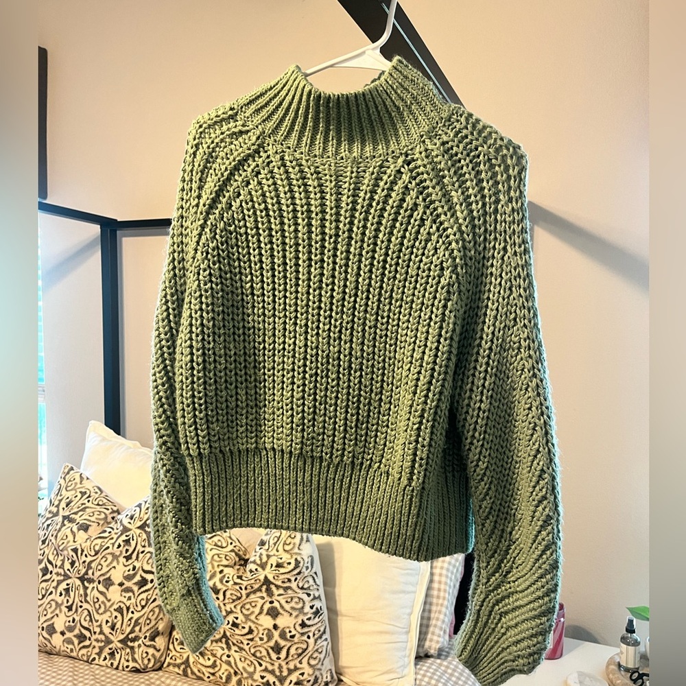 Green chunky cable knit sweater